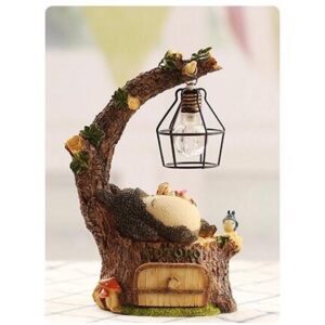 Totoro ngồi gốc cây